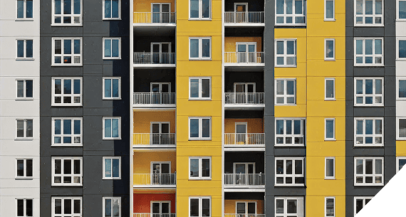 Yellow, grey and white apartment building